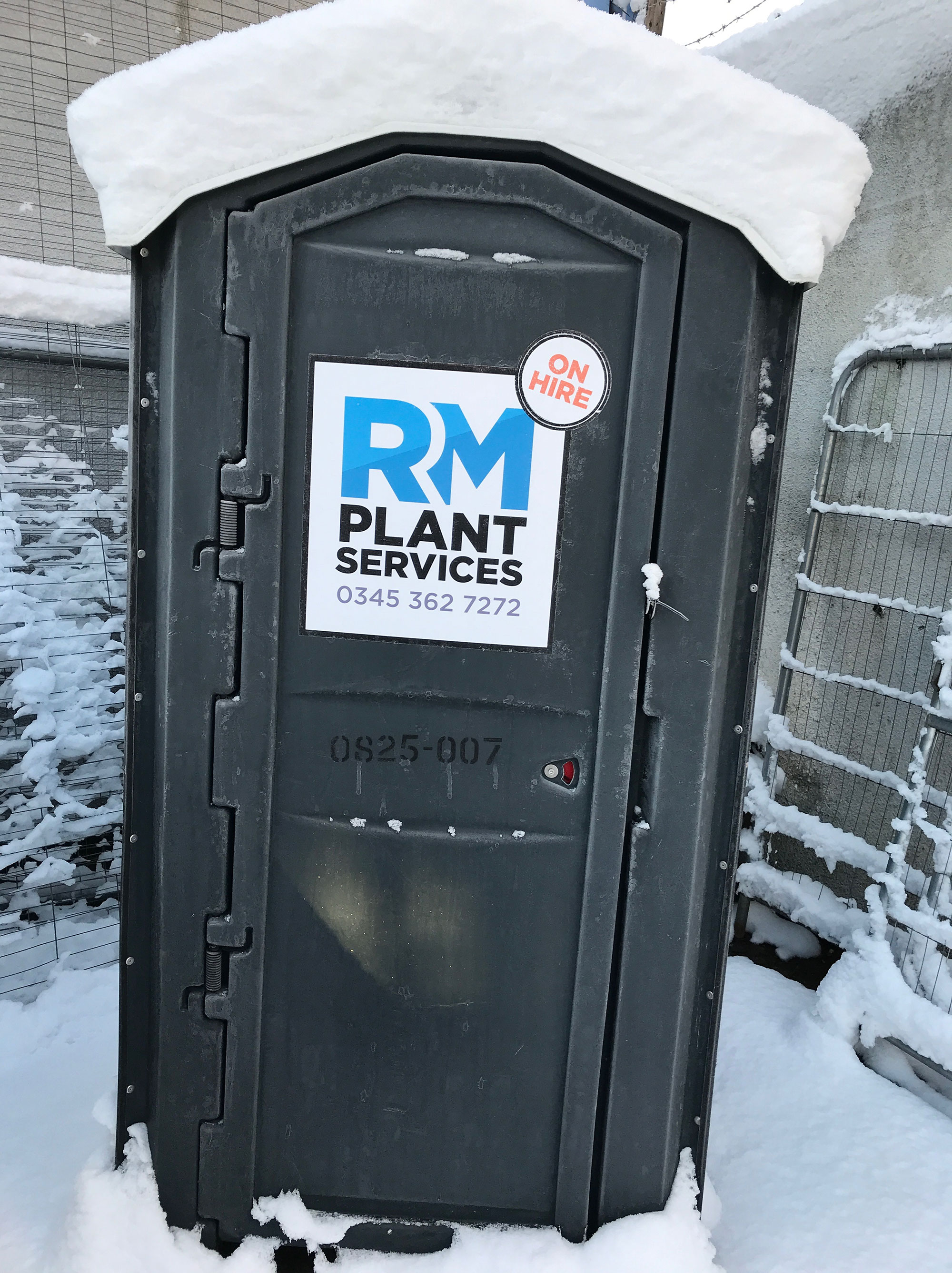 RM portable toilet in the snow